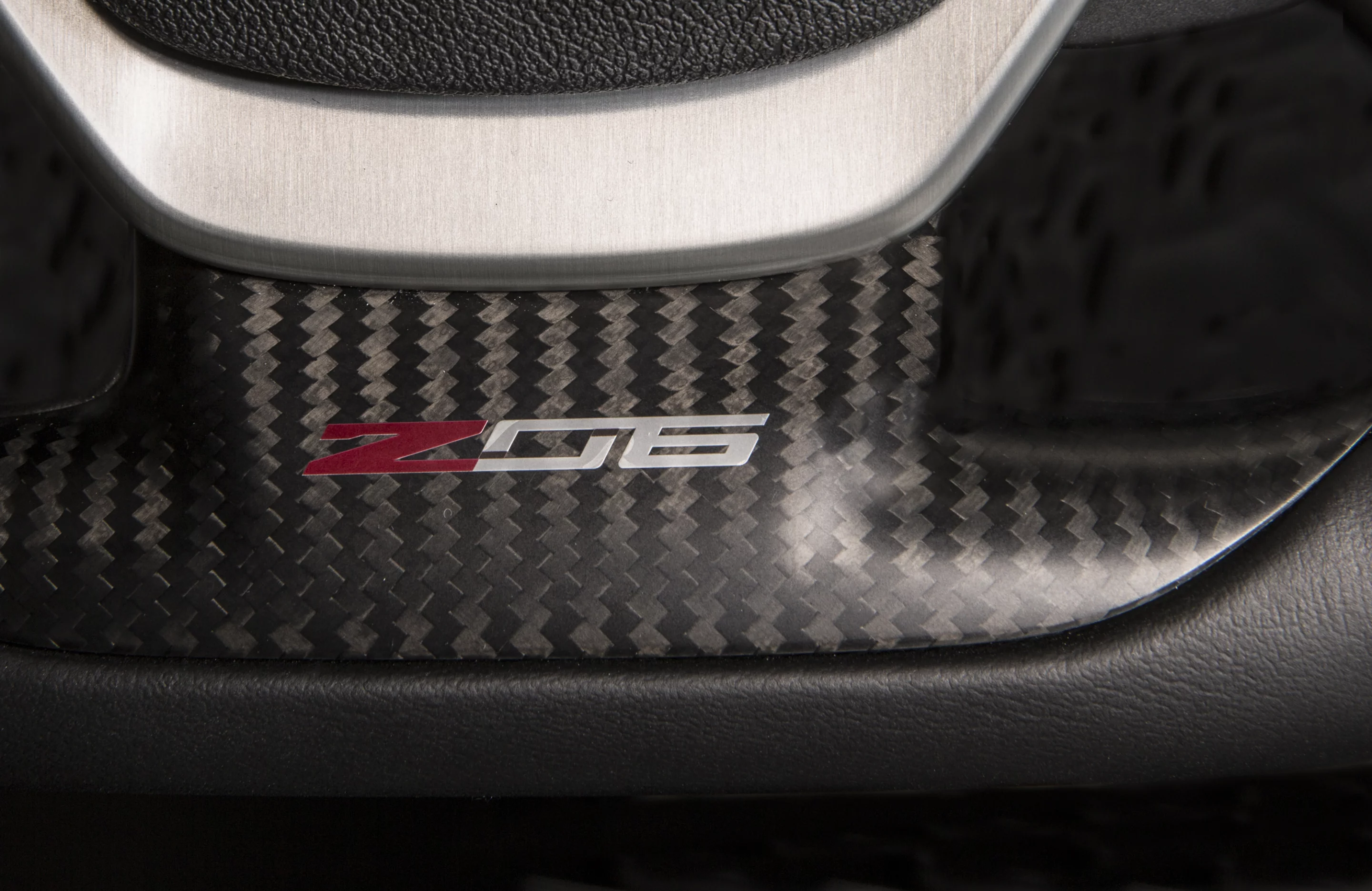 The Z06 comes with flat bottomed steering wheel with carbon fiber inserts