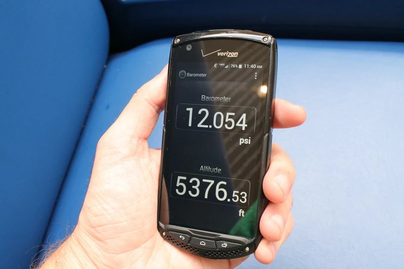 A barometer and compass app are featured in the Brigadier skin