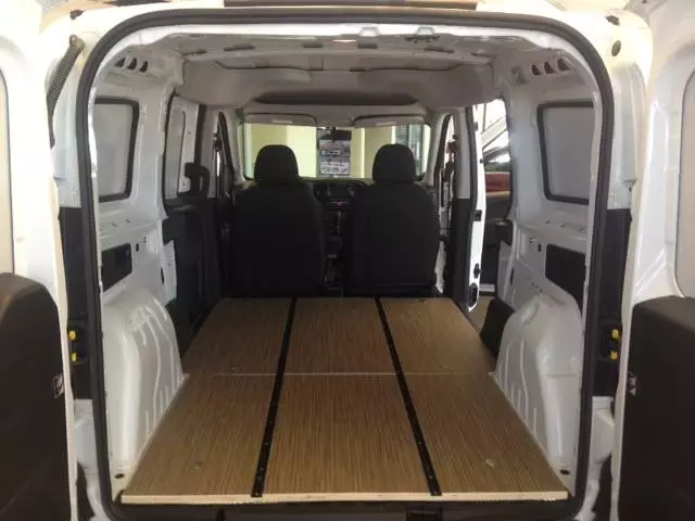 The vinyl floor with mounting tracks makes the modules easy to slide in and out