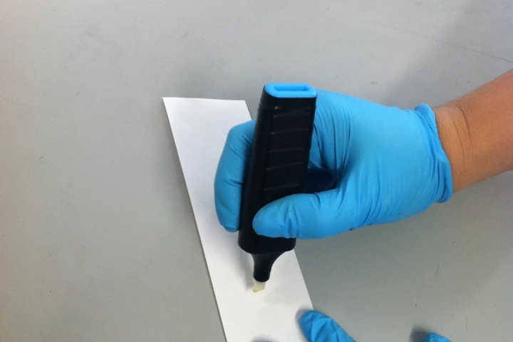 The "magic" marker helps determine whether a receipt potentially containing fingerprint deposits is made of thermal paper (Photo: University of Leicester)