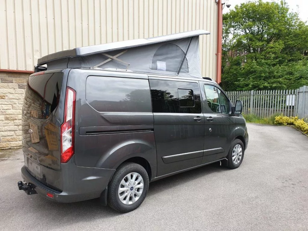 The Le-Tour sleeps up to four people on a combination of standard sleeper roof and available folding bed