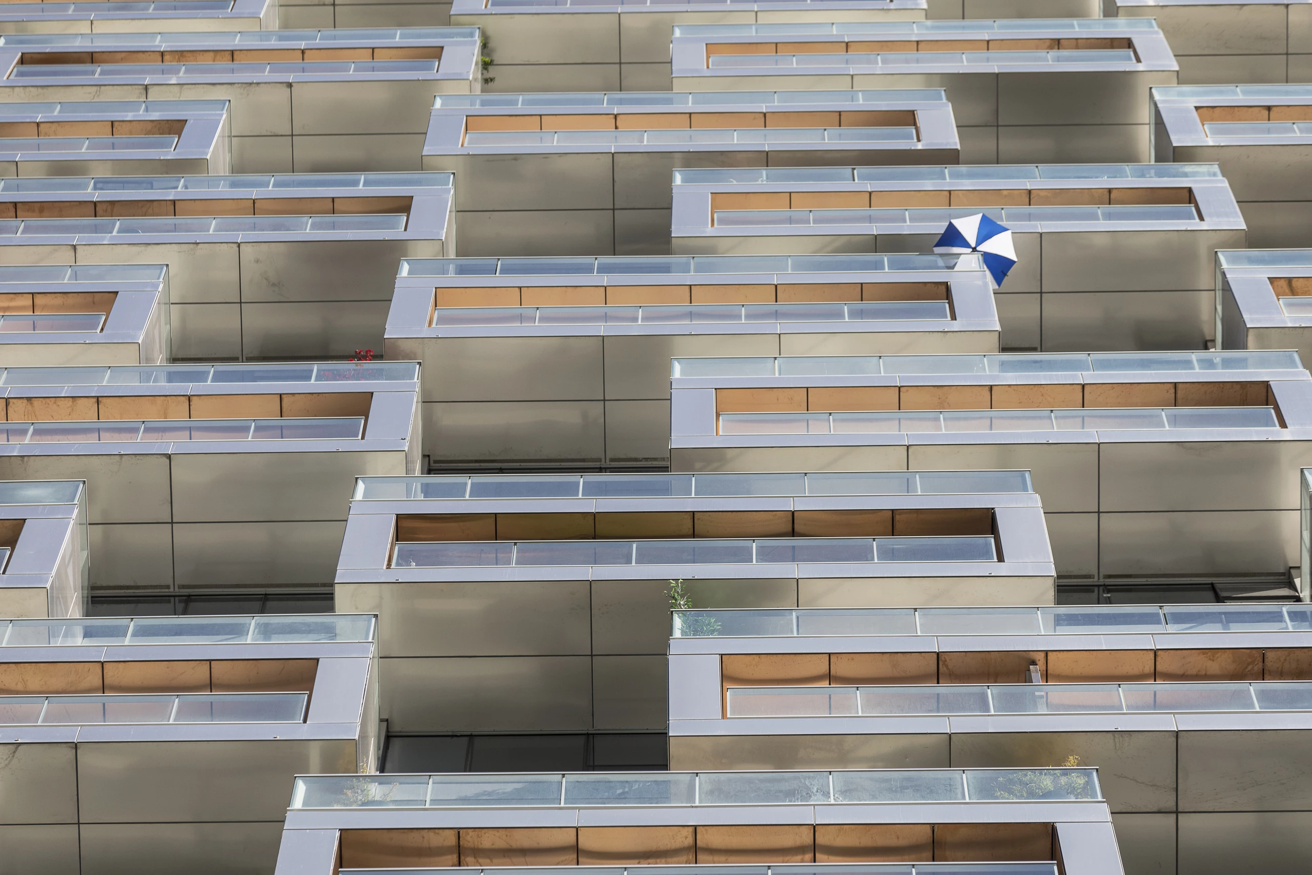Vancouver House's patterned steel facade creates outdoor terrace areas and balconies for residents