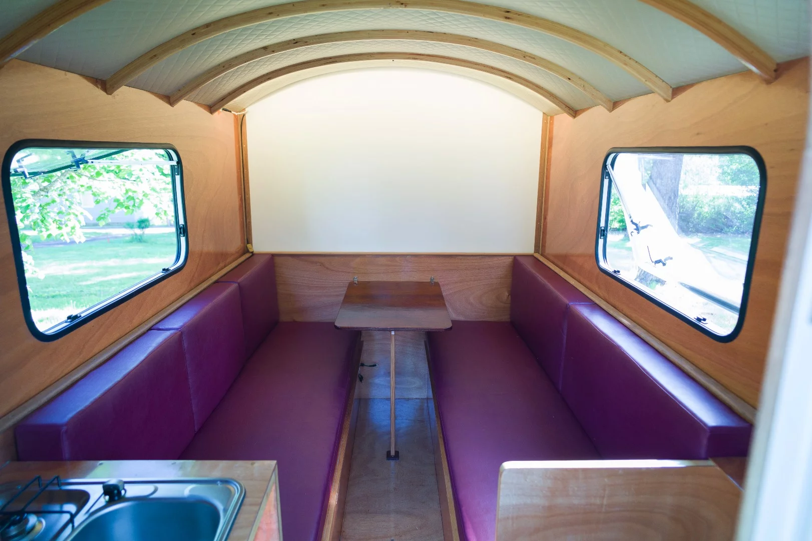 The table affixes with a few wing nuts, creating the dining area