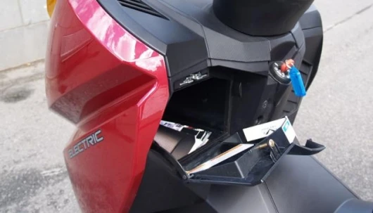 Push the key in and turn left to open the large glovebox.