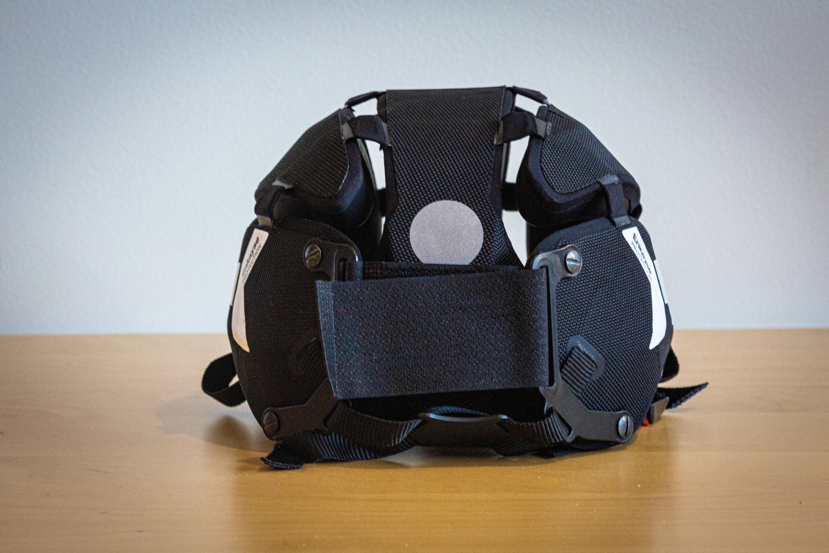 Big ol' Velcro strap across the back adjusts to any head size