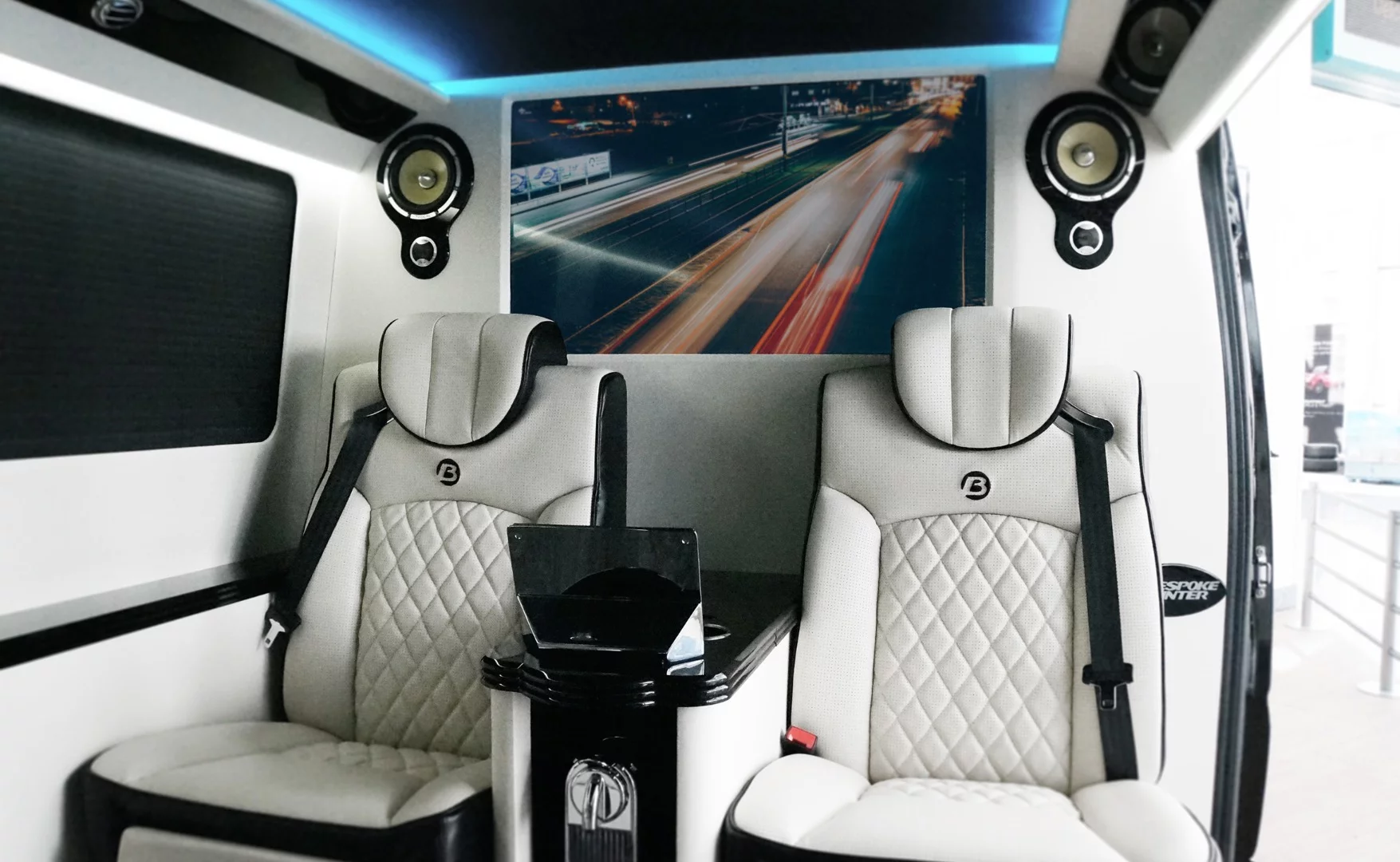 The 144 has a 40-in Samsung LED TV in front