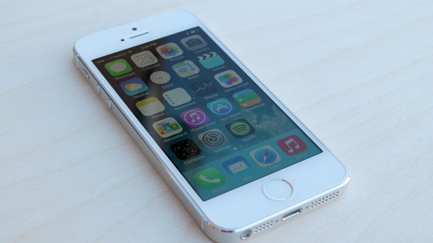 The iPhone 5s runs Apple's redesigned iOS 7