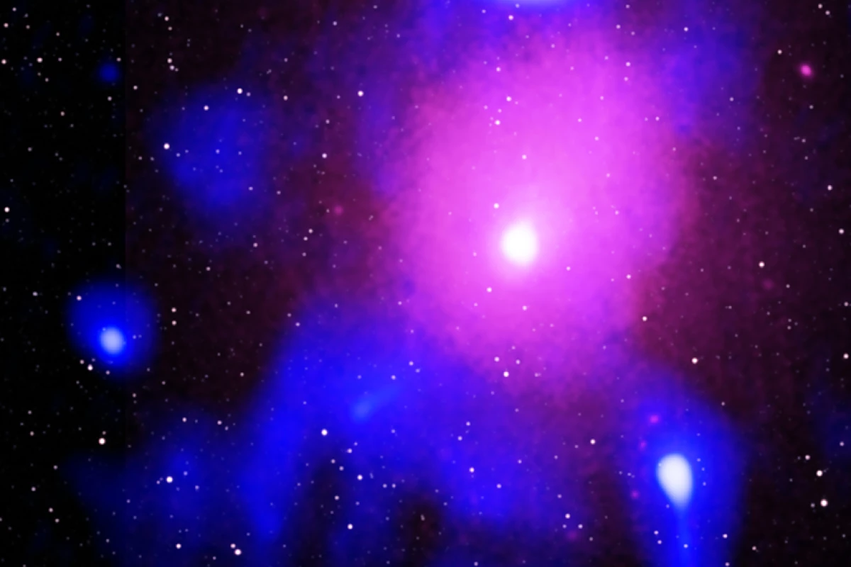 Composite false-color image of the most powerful black hole eruption in the universe
