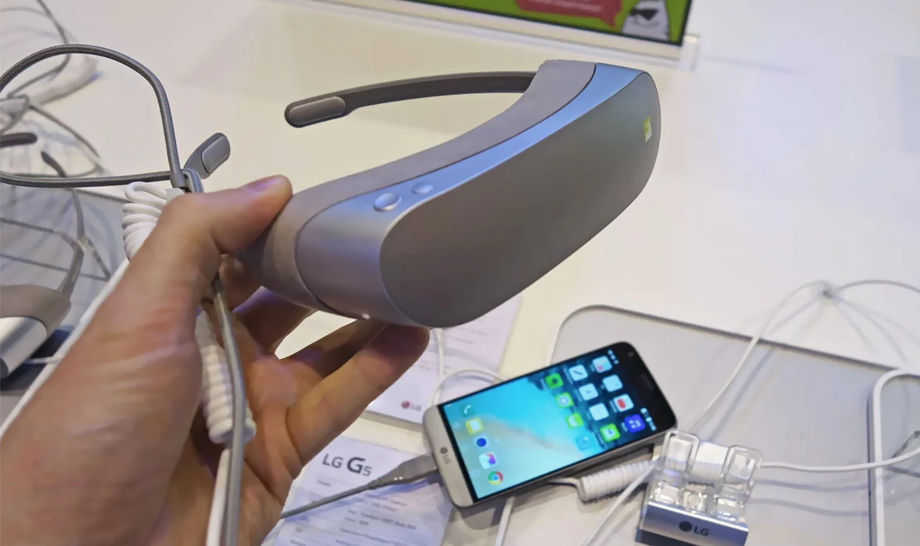 A USB cable keeps phone and headset connected