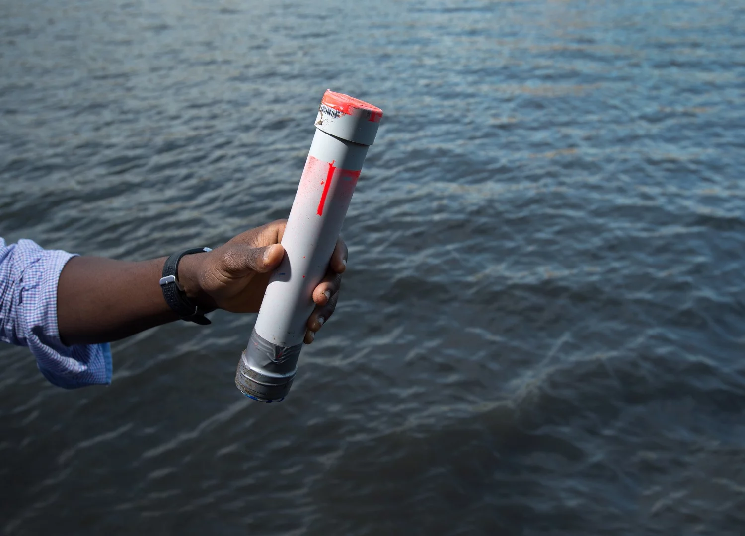A Drifter device, about to be deployed in a Brisbane river