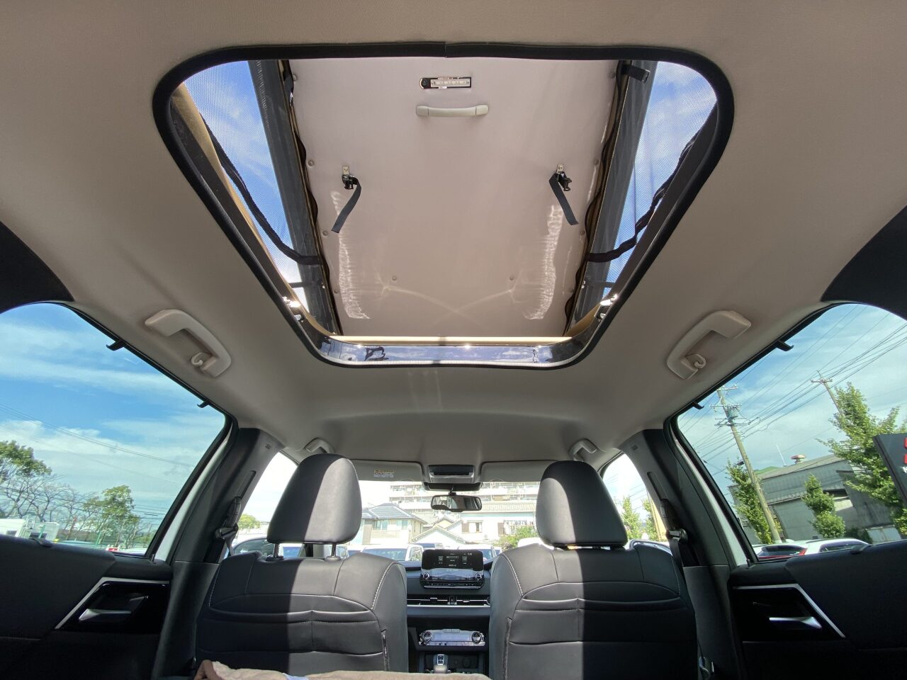 E:Pop's roof opens up extra headroom and features a low double bed