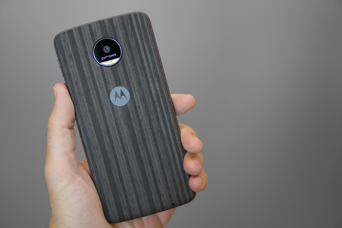 The natural wood Moto Mod, which is included in the box with both phones