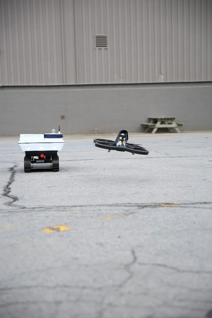 GE robotic rover working in collaboration with a drone