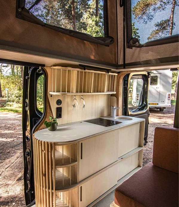 Amstervan owners will probably want to store the wine glasses somewhere safer during the drive, but they look nice dangling there at camp