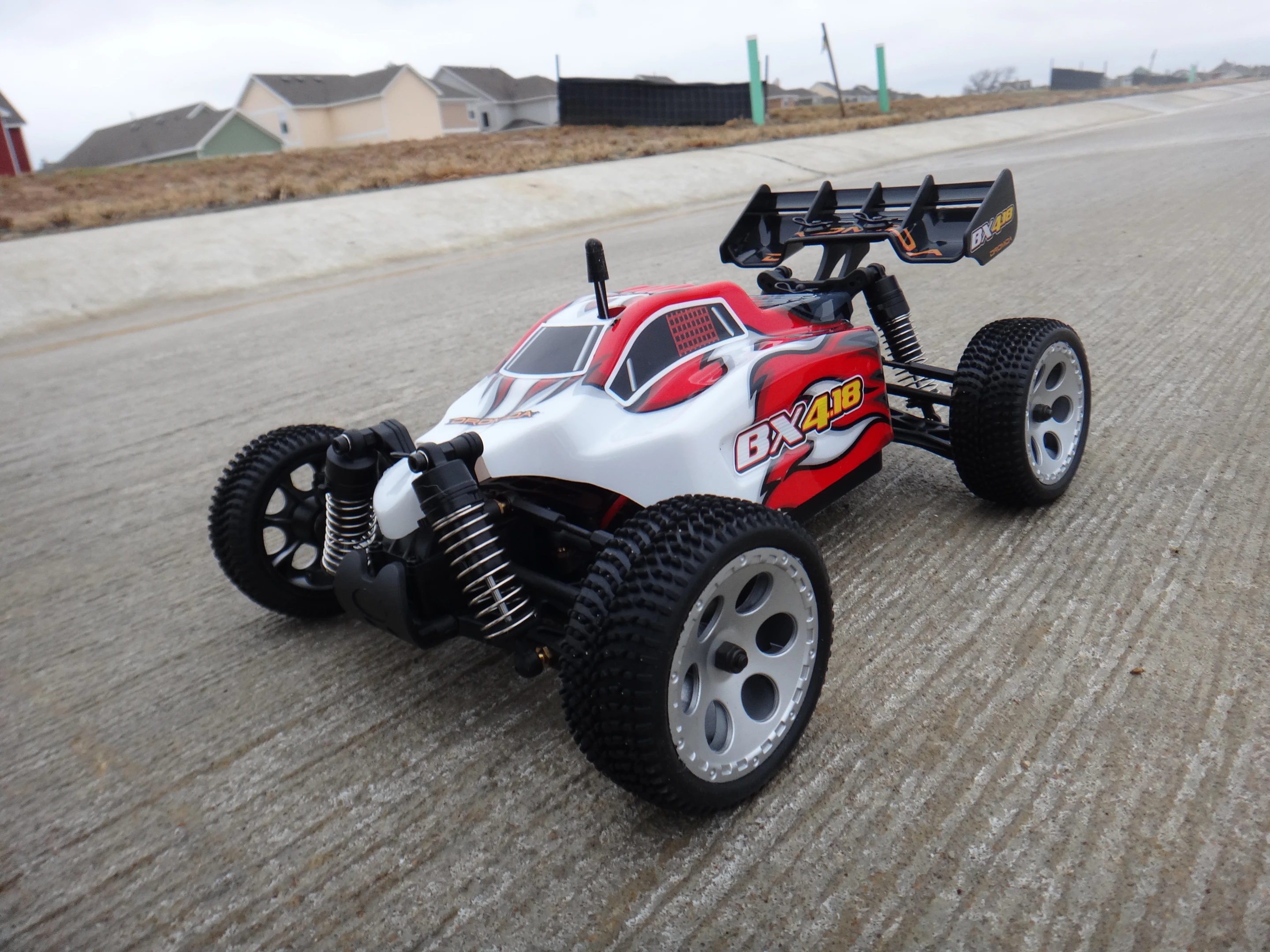 The box claims it can hit over 20 mph (32 km/hr), which seems accurate and is pretty good for a mid-range R/C car