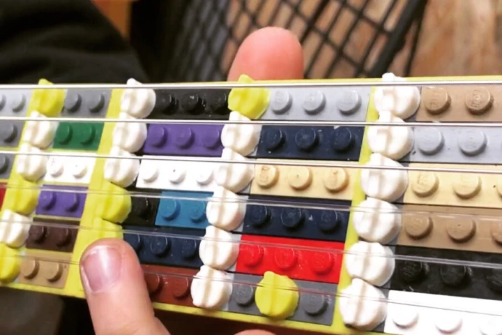 The Lego Microtonal Guitar can be used to play semi-tones, or tones inbetween the semi-tones