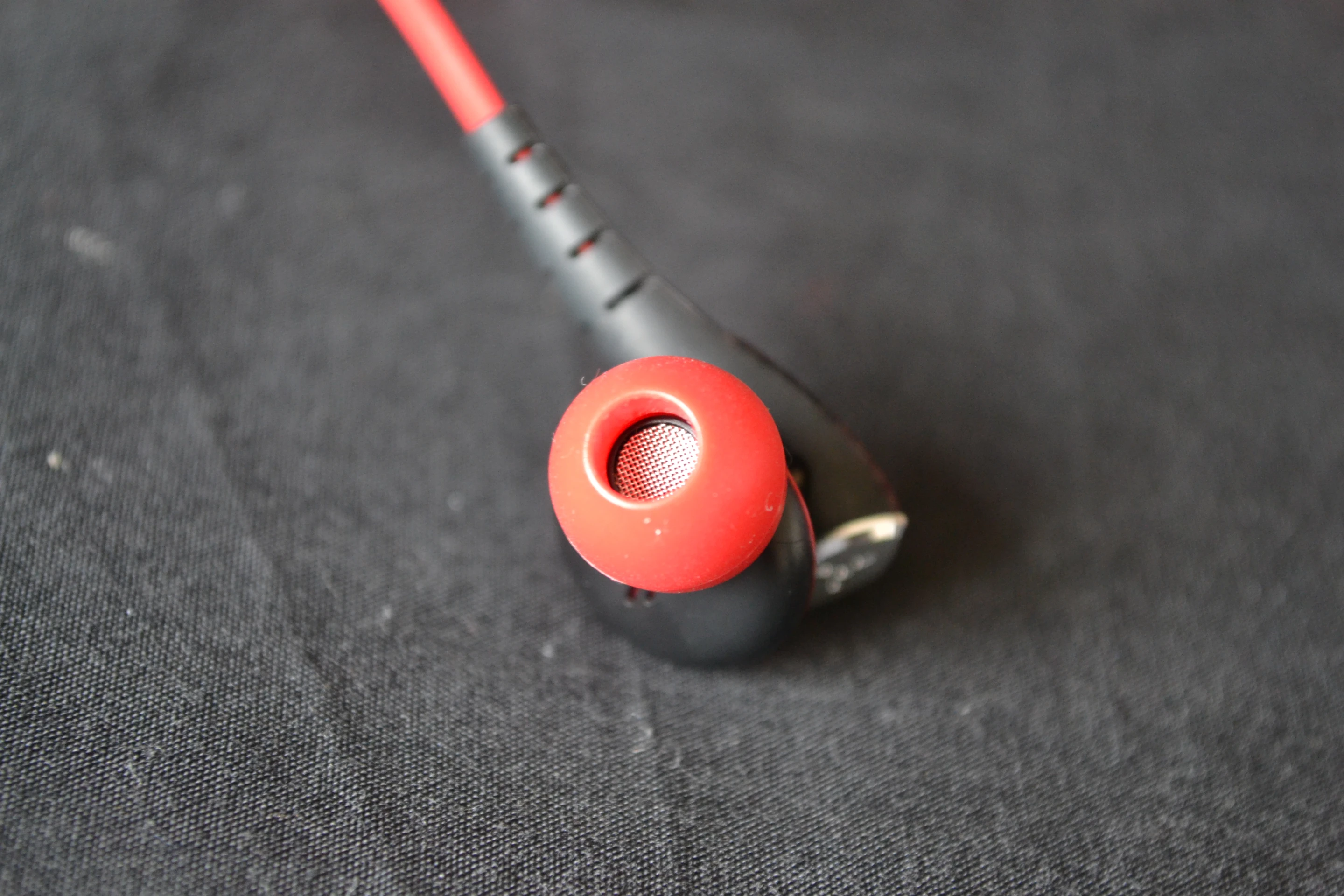 Each ear piece has a custom 14.3-mm dynamic speaker driver with an acoustic damper in front