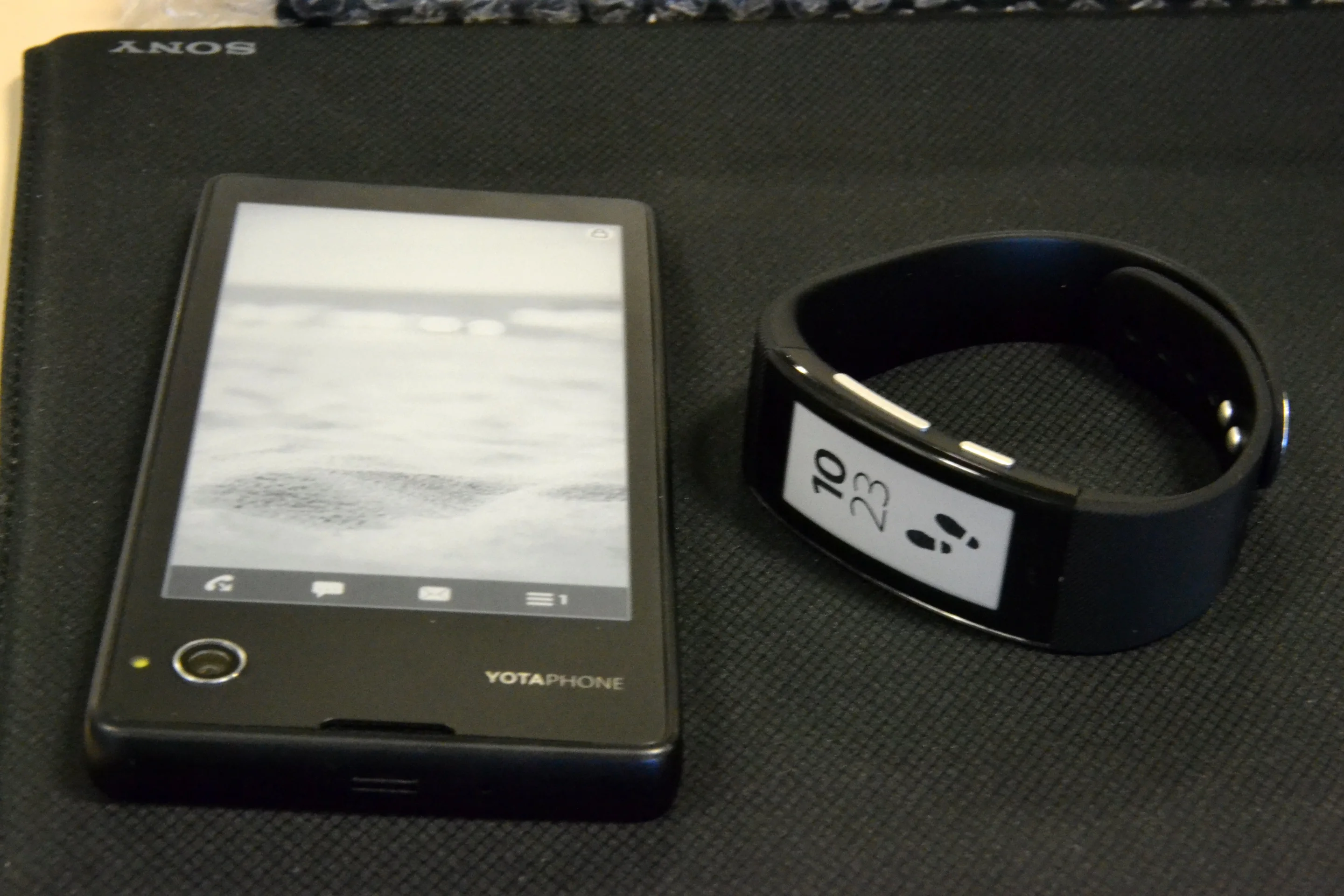 The YotaPhone (left) and Sony's new SmartBand Talk (right) (Photo: Paul Ridden/Gizmag)