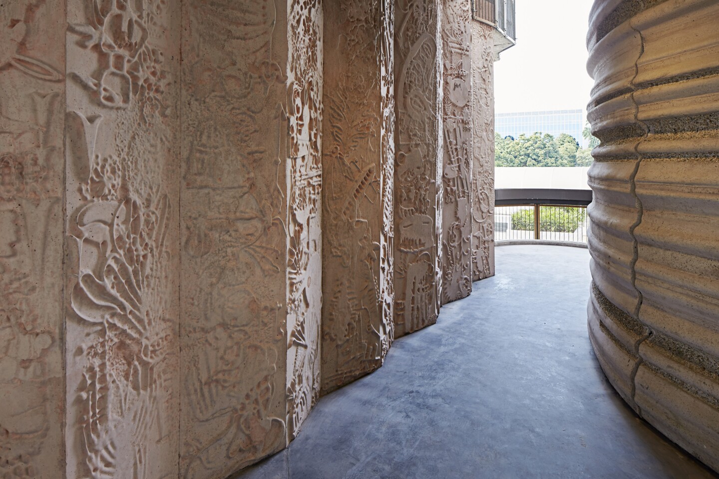 The concrete stair and elevator cores are decorated with 700 drawings, three-dimensionally cast into the concrete (Photo: Hufton and Crow)
