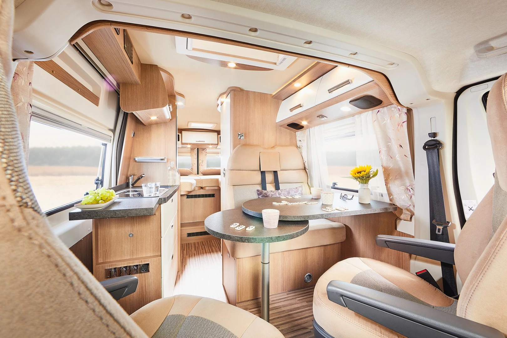 This photo of a different Malibu van shows the usual roof separation between the driver cab and the camper cabin
