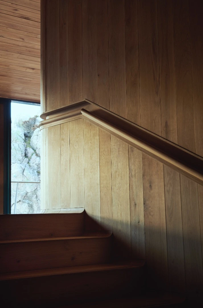 Under's visitors descend down an oak staircase
