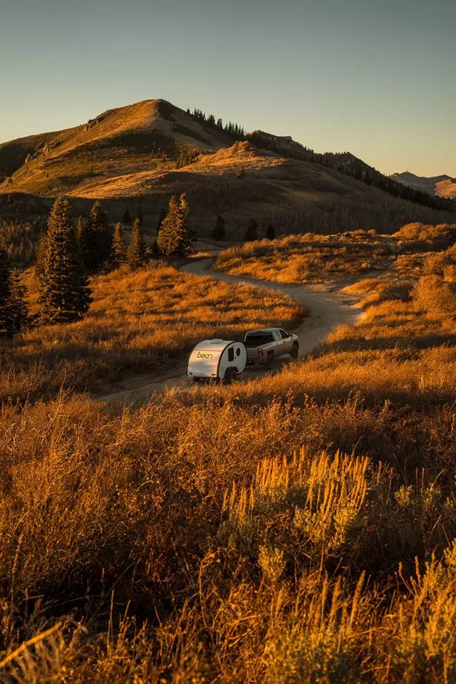 Riding toward a mountaintop getaway with the Bean Trailer