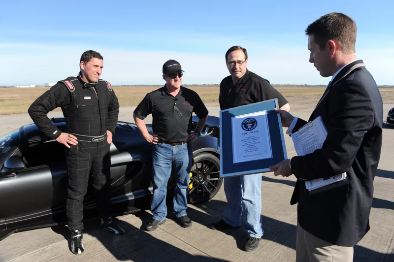 The Hennessey team receives their Guinness World Record for fastest accelerating production car