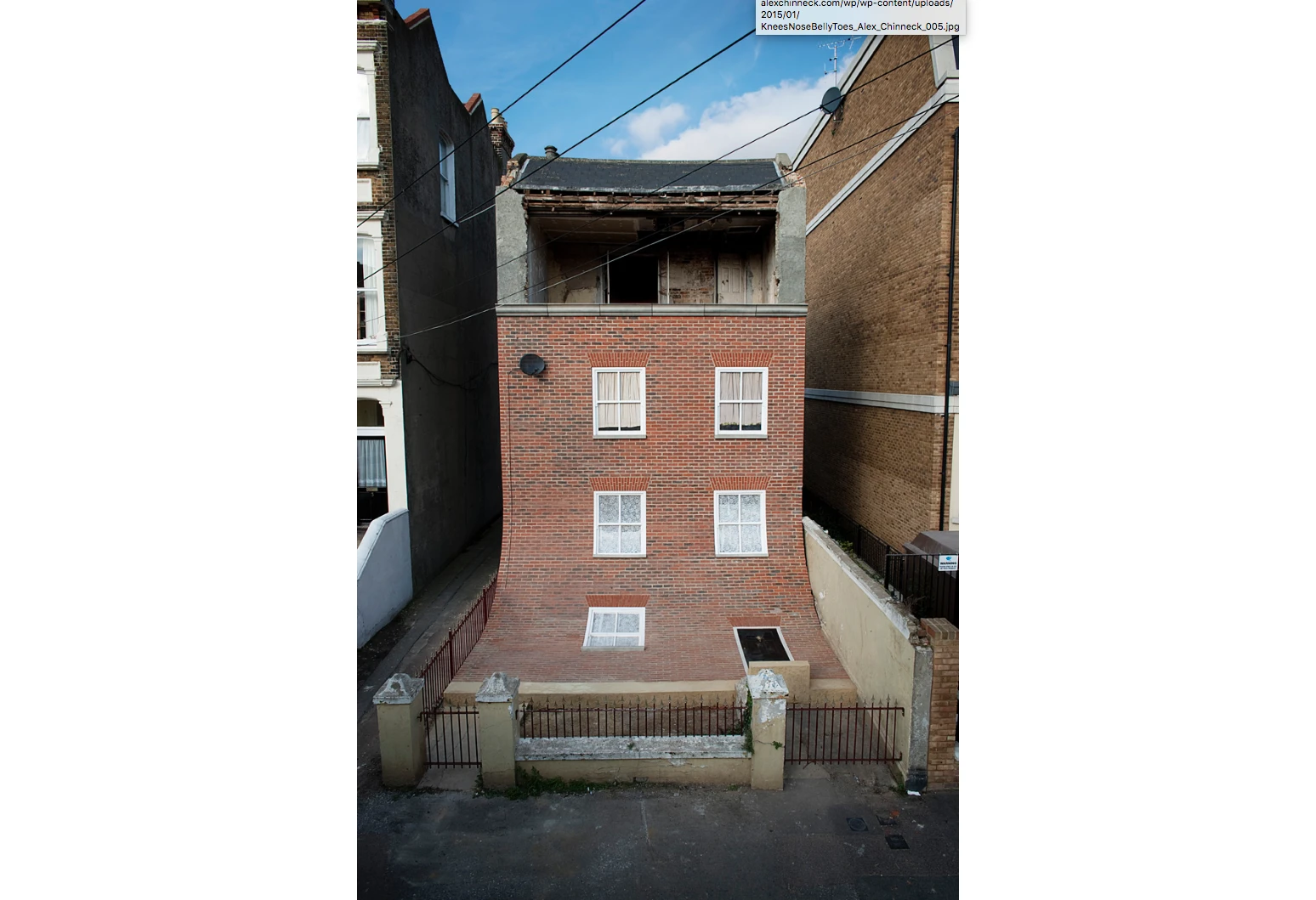 From the knees of my nose to the belly of my toes gave the impression a facade was slipping off the building, revealing a top floor usually hidden behind brickwork