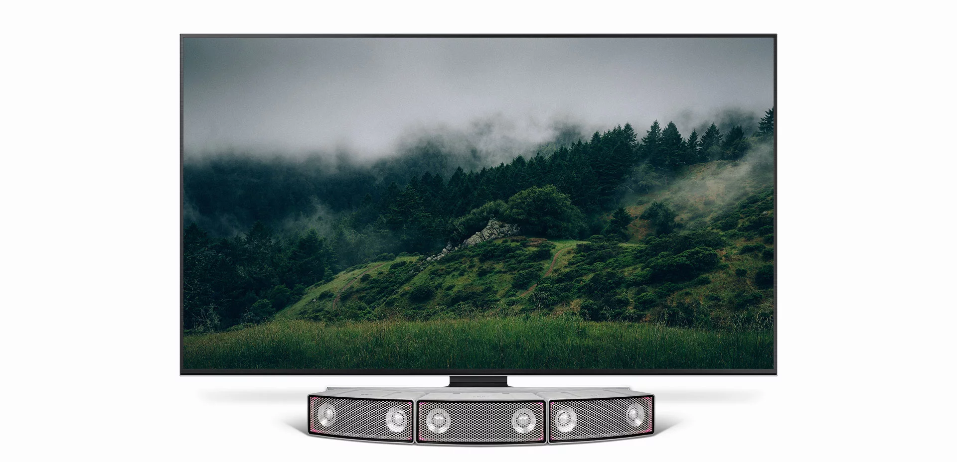 Three Soundots speakers working together to form a curved TV soundbar