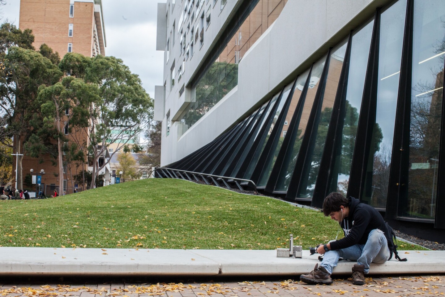 On the exterior, the library is shrouded with a man-made rolling lawn, which stretches along the south side of the structure