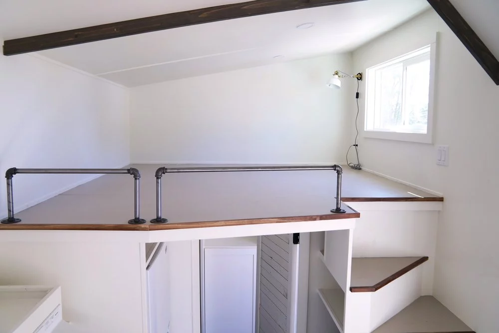 The Coastal Craftsman's sole bedroom loft