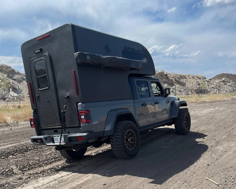 The High Altitude Ultralite TB50 is lighter and cheaper than a slide-in camper but more protective than the typical pop-up topper