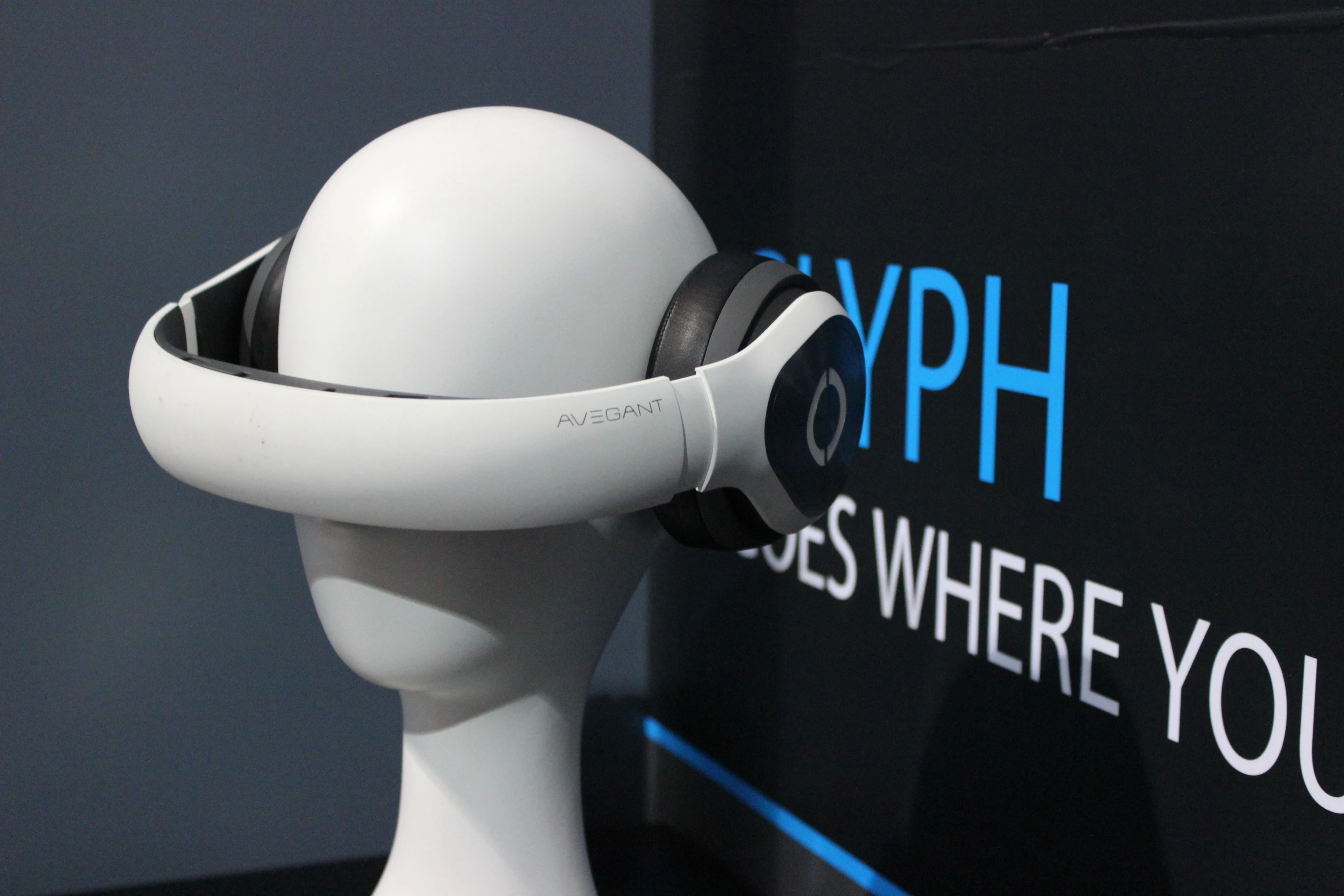Though it's going to make you a conversation piece in the places where it (otherwise) makes the most sense, the Avegant Glyph hides a private screen in the band of an oversized pair of headphones