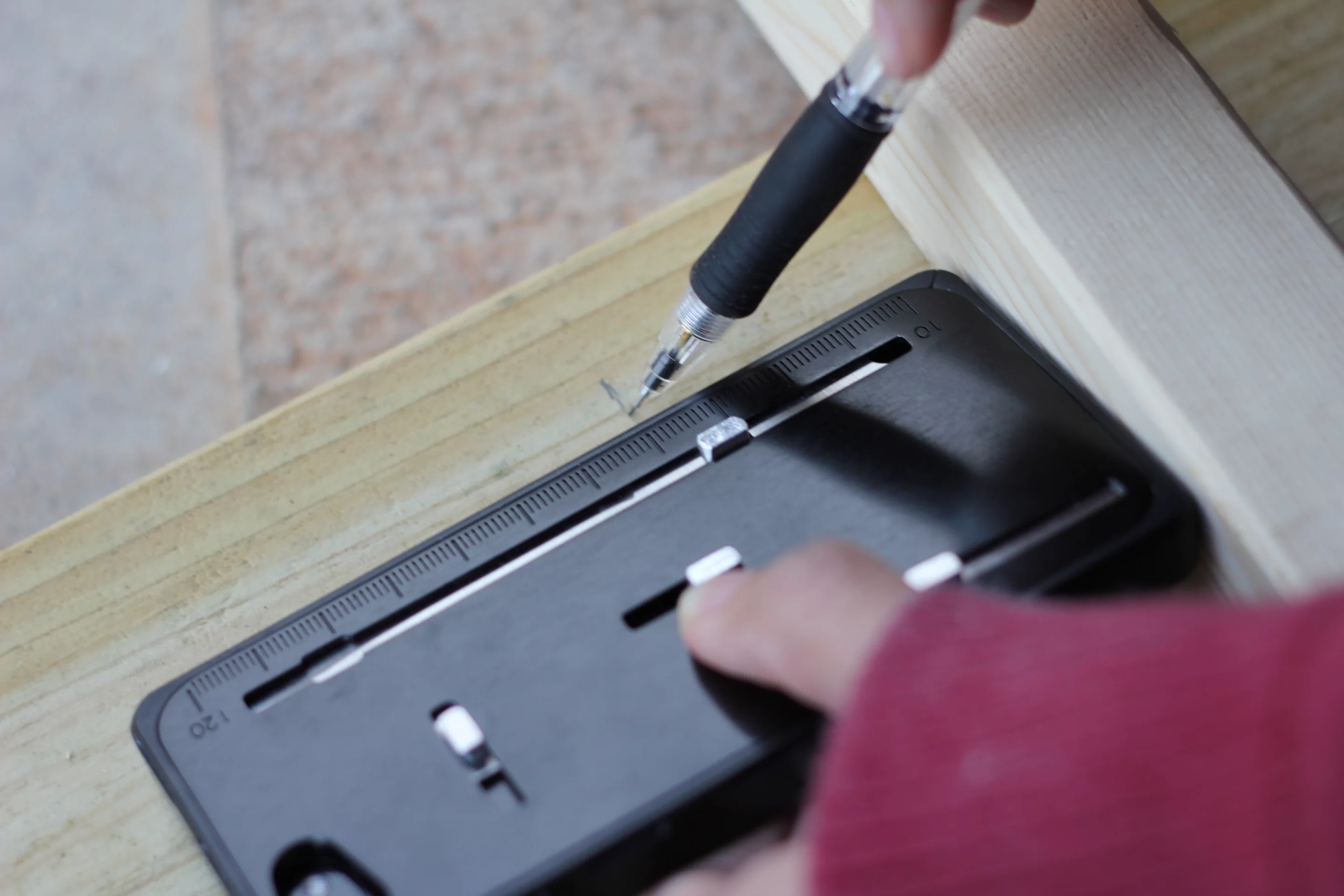 A series of buttons releases the tools