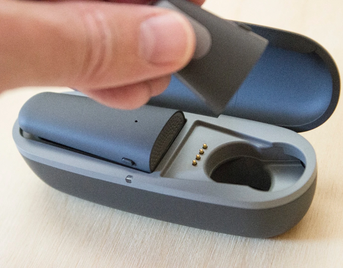 The two pieces charge inside the portable case