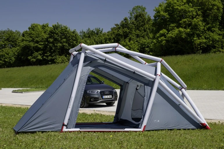 The Audi Q3 peeks through the Heimplanet's open vestibule