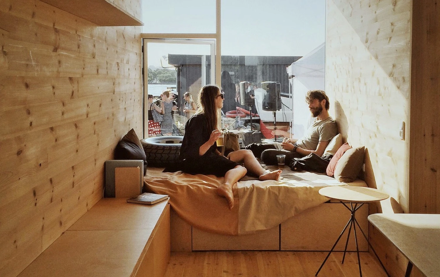 The bedroom features a daybed that doubles up as general seating