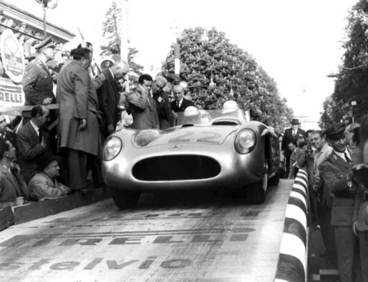 On May 1, 1955 Stirling Moss and Denis Jenkinson started at 7.22 a.m. hence the number on the bodywork of this silver racer