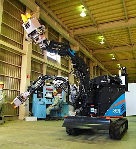 Hitachi's ASTACO-SoRa robot has two arms which can lift up to 150 kg (330 pounds) each, and can exchange its tools at the work site