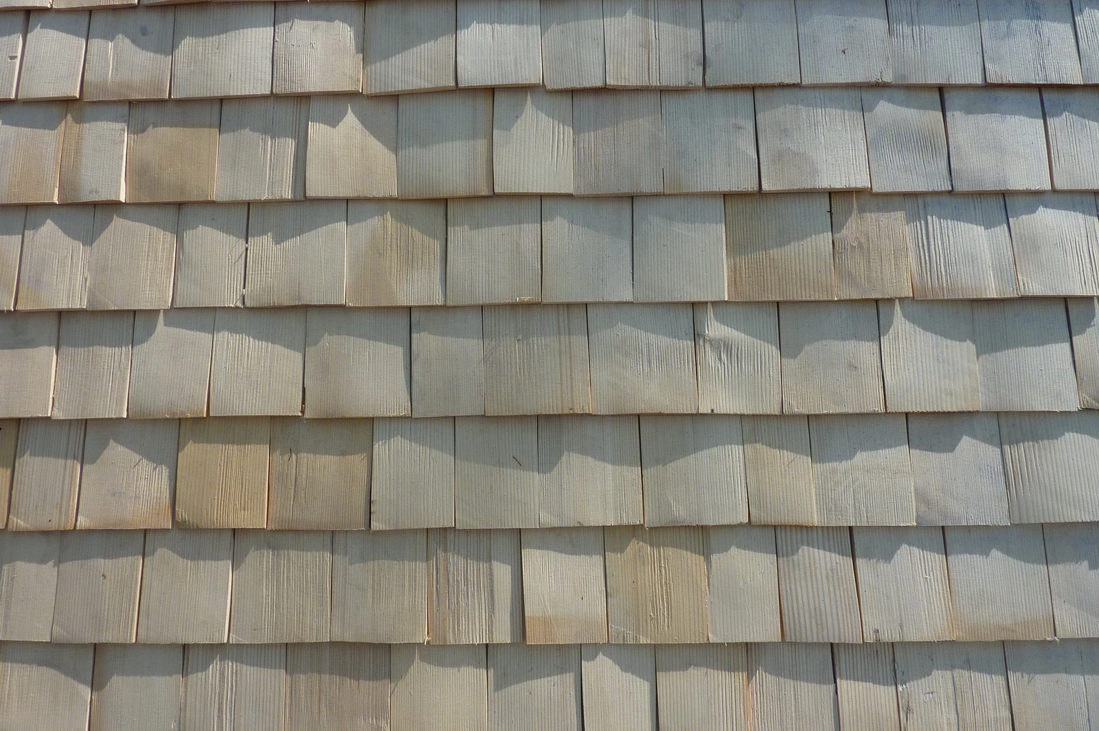 The roof is constructed from wood shingles