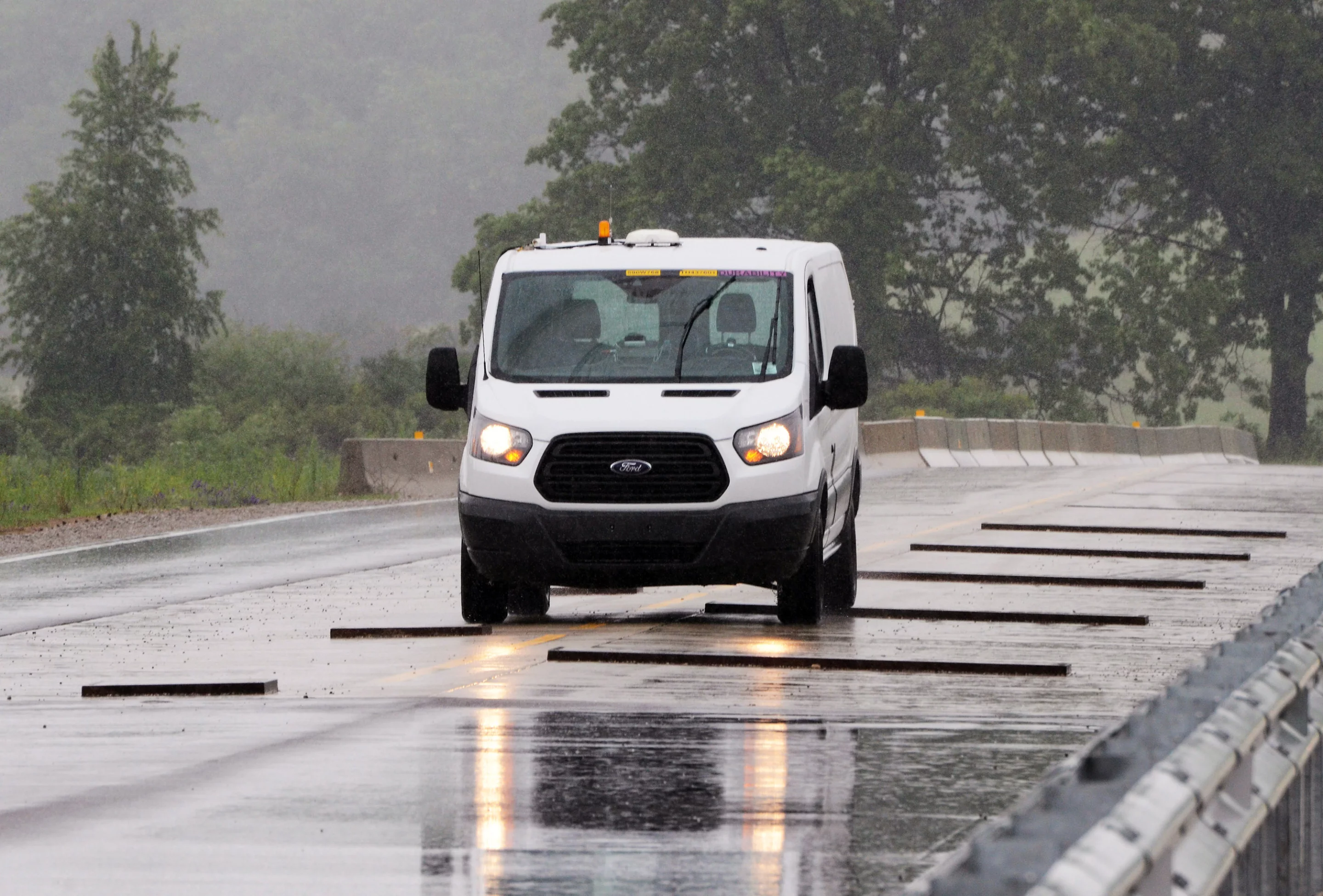 The Ford test track can put ten years of wear on a car after ten minutes