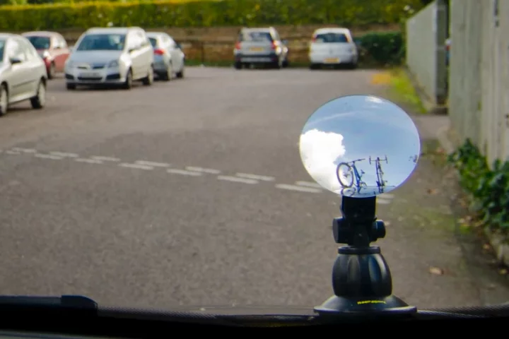 The RoofScope mounts on the hood, and is viewed from the driver's seat