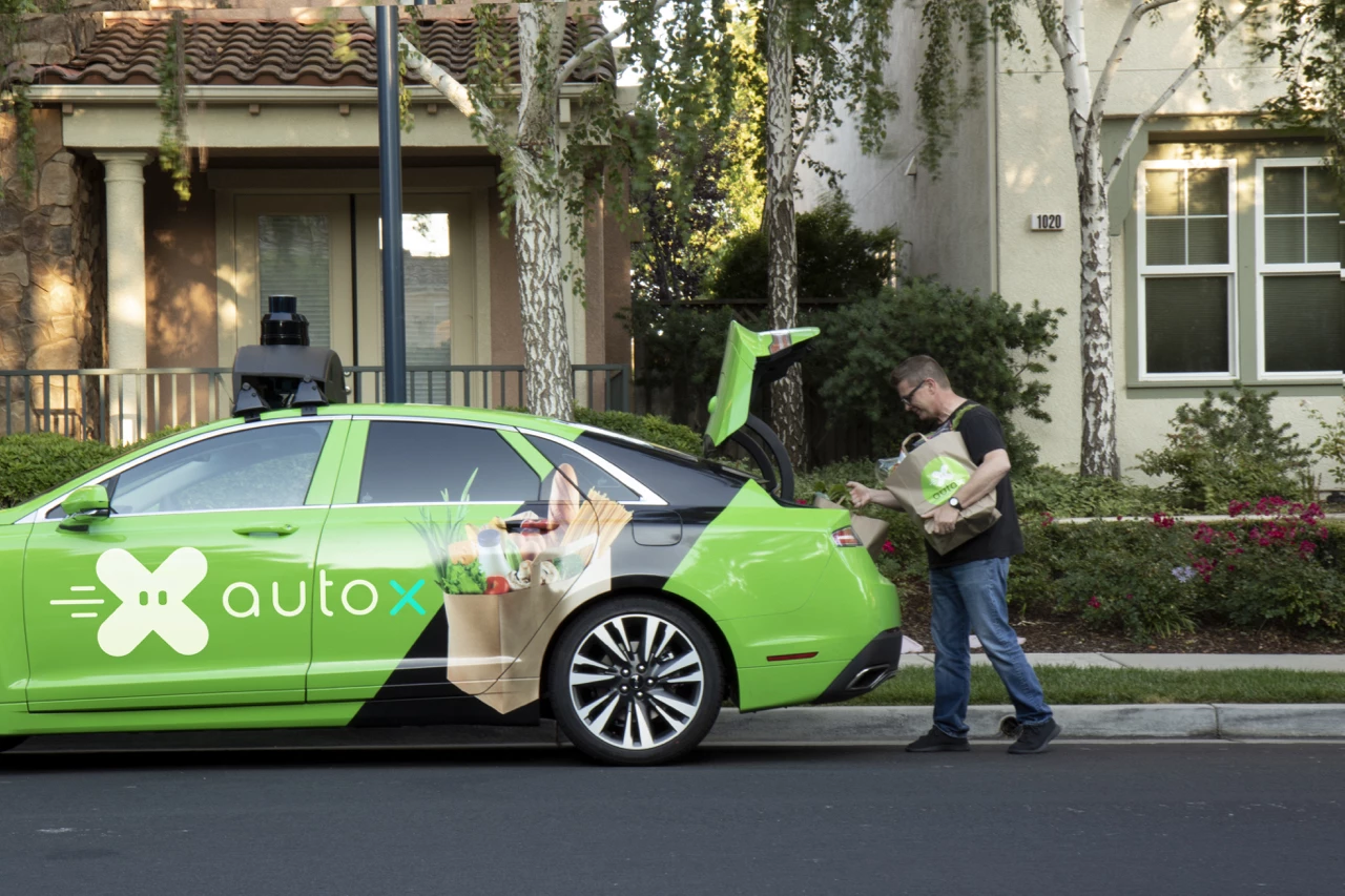 The app will alert AutoX users when the car arrives, so they can head outside to remove their order from its trunk