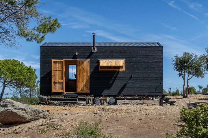 The Morena is crafted from timber and features an eye-catching charred wooden exterior