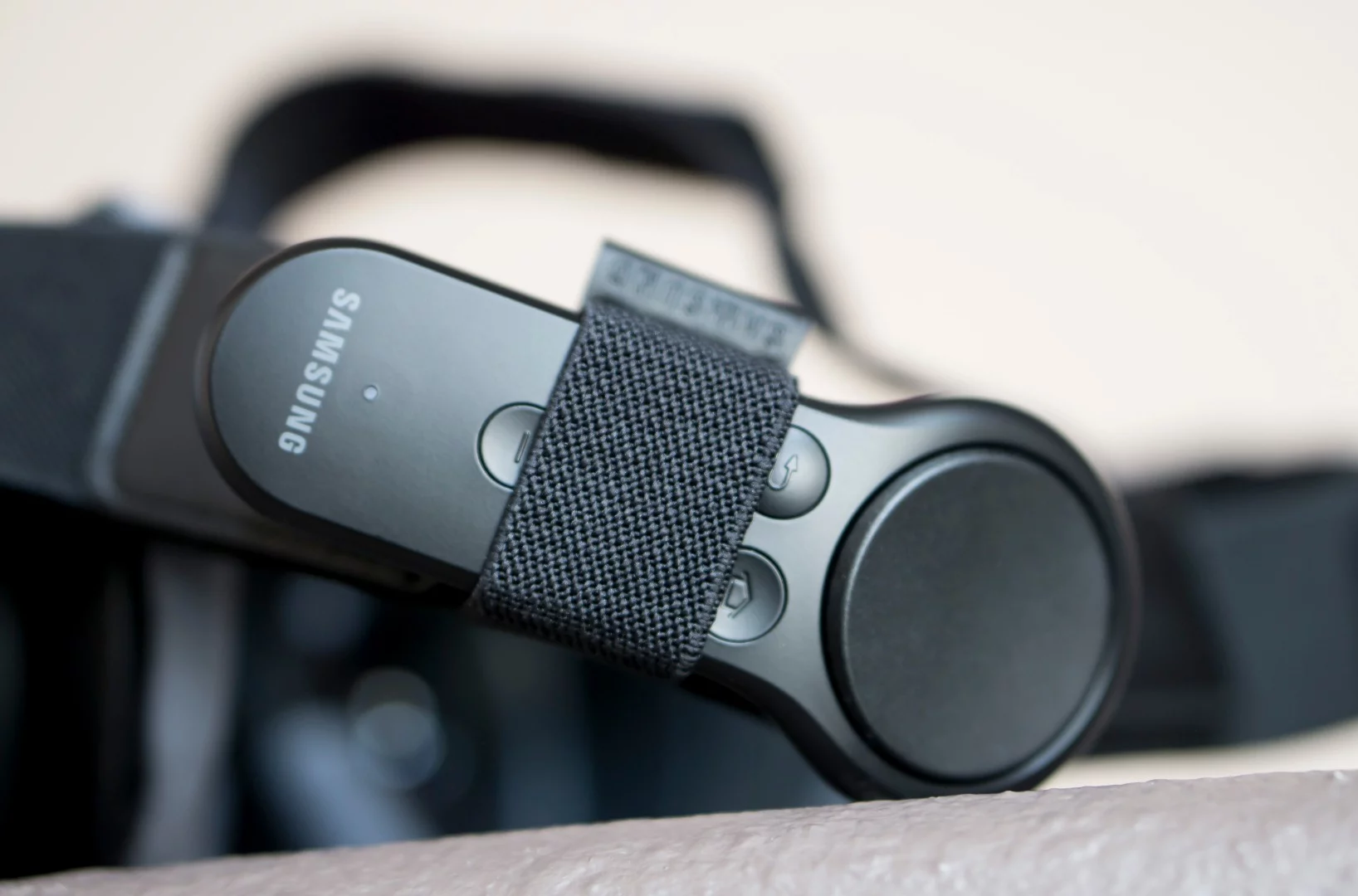 You can stash the controller on the headset's strap (handy if you often lose things) when you aren't using it