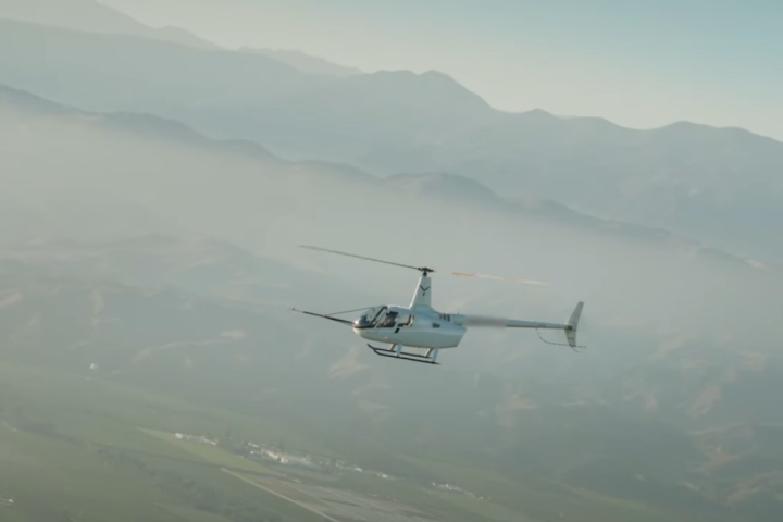 The Robinson R-66 begins to plummet in the world's first automated autorotation landing