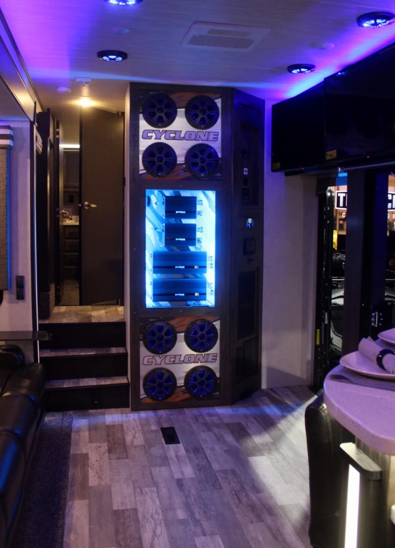 The custom audio system includes 18 speakers and eight subwoofers