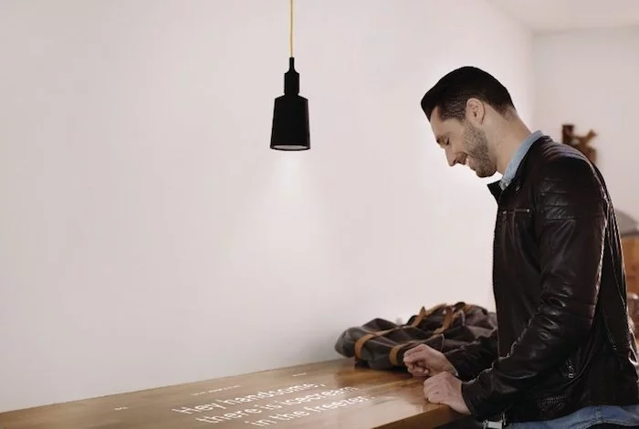 The Beam is a portable projector that can screw into any light socket