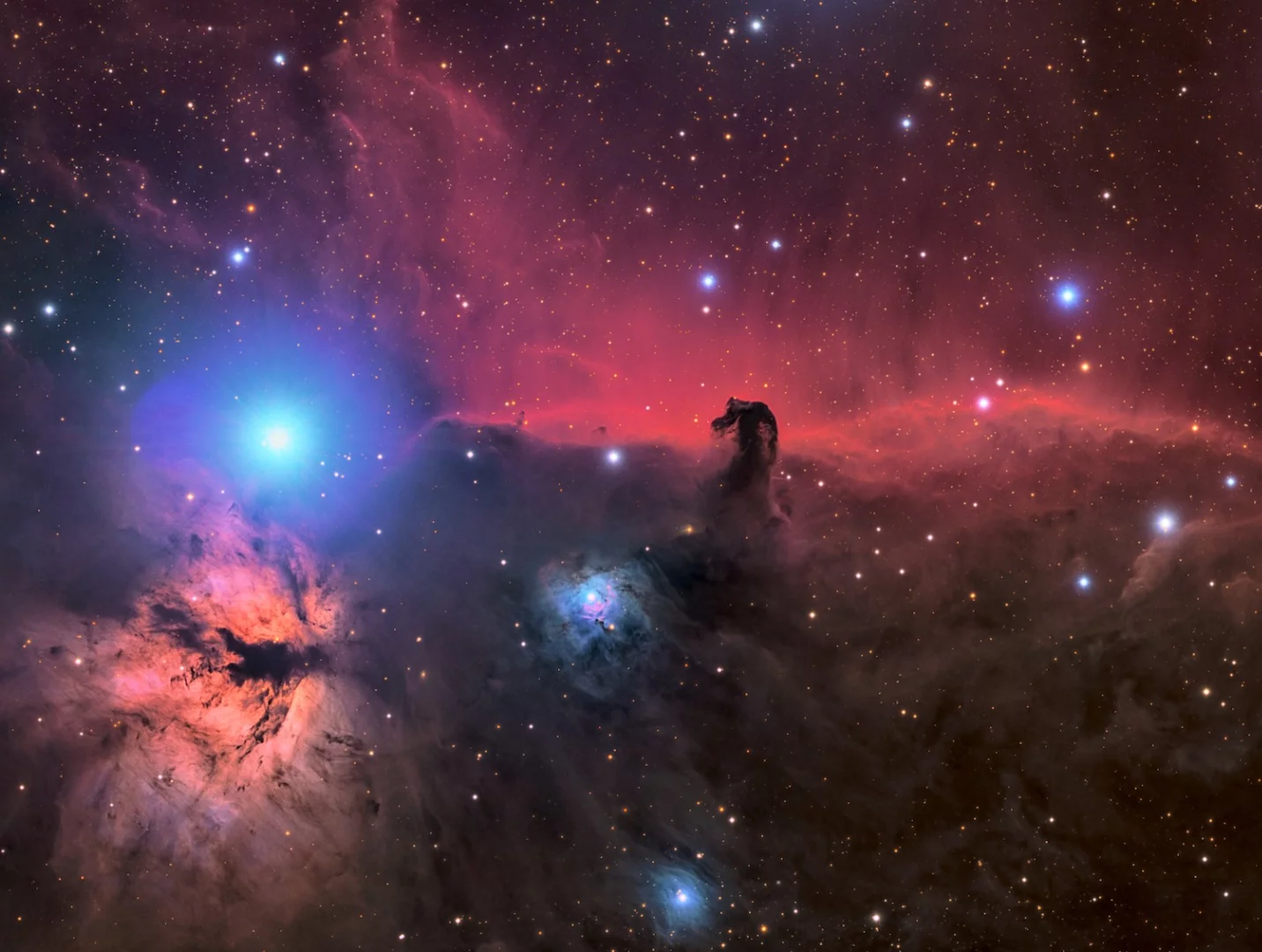 This image was heavily inspired by Ken Crawford's photo of the Horsehead Nebula which perfectly showcased the hydrogen filaments located within the blue reflection nebula, NGC 2023, just below the Horsehead. The small pink filaments contrast beautifully against the blue reflection nebula. The photographer thinks of those small filaments as the cherry on top of this spectacular region of the night sky caught in a swirl of dust and gas.Deep Sky West Observatory, Rowe, New Mexico, USA, 27 November 2018