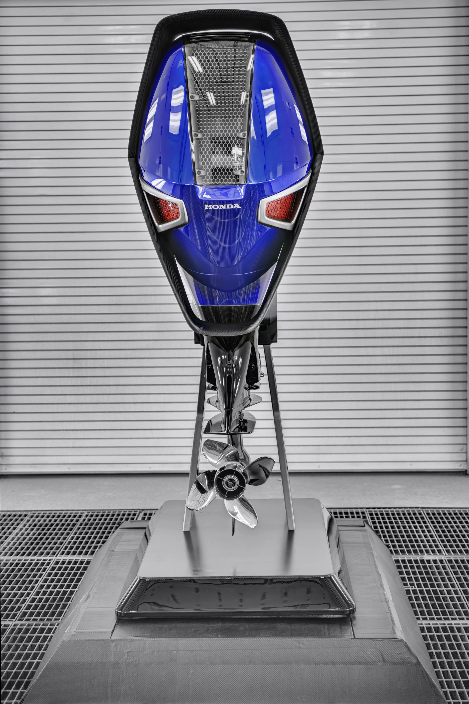 Honda's engine includes a unique winged blade and automotive-inspired mesh grilles